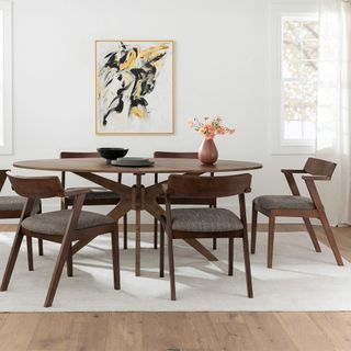 The Everyone’s Invited Bundle, contains products [Zola Dining Chair - Volcanic Gray] and [Conan 75" Oval Dining Table - Walnut].