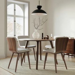 The No-Nook Bundle , contains products [Seno 47" Round Dining Table - Walnut] and [Sede Dining Chair - Walnut and Mist Gray].