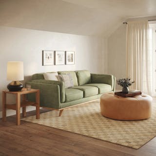 The Classic Materials Bundle, contains products [Timber 90" Sofa - Olio Green] and [Timpani 41" Leather Ottoman - Charme Tan].