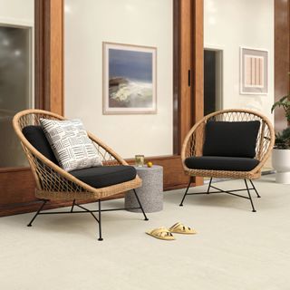 The Heart-to-Heart Bundle, contains products [Aeri 37" Outdoor Lounge Chair - Slate Gray] and [Solina Outdoor Stool - Gray Terrazzo].