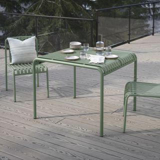 The Sarek Small Dining Set, contains products [Sarek 35.5" Outdoor Dining Table - Khaki Green] and [Sarek Outdoor Stackable Dining Chair - Khaki Green].