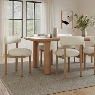The (Extended) Gourmet Gathering Bundle, contains products [Adel 82.5" Dining Table - White Oak] and [Munk Dining Chair - White Oak and Ivory Wool Bouclé].
