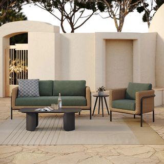 The Aby x Skane Lounge Bundle, contains products [Aby 69.5" Outdoor Loveseat - Dravite Green], [Aby 33" Outdoor Lounge Chair - Dravite Green] and [Skane 48" Outdoor Coffee Table - Black].