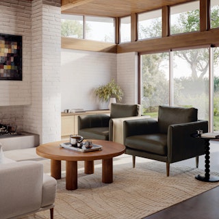 The Scandinavian Serenity Bundle, contains products [Burrard 32" Leather Lounge Chair - Charme Green] and [Adel 42" Round Coffee Table - Smoked Oak].