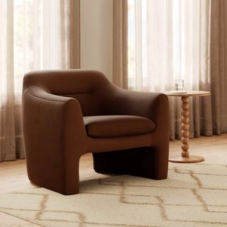 The Classic Curves Bundle, contains products [Eleanor 34" Velvet Lounge Chair - Hale Earth] and [Hallie Side Table - Smoked Oak].
