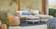Aby Dravite Ivory Reversible Sectional - Gallery View 3 of 15.